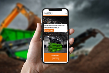 Darstellung der neuen Startseite von Haberl Baumaschinen auf einem iPhone